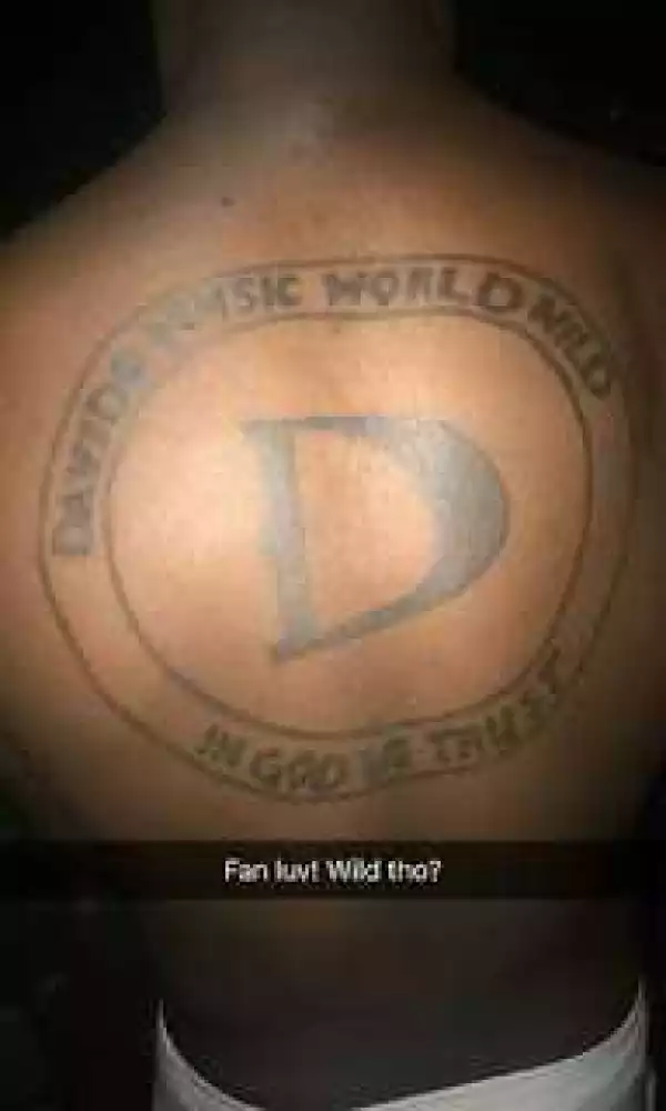 Davido Shows off His Fan Huge DMW Back Tattoo [Photo]